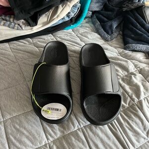 OOFOS Black Slide Sandals with Touch of Neon